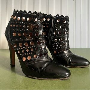 Alaia Patent Leather Laser Cut Spike Heeled Boots